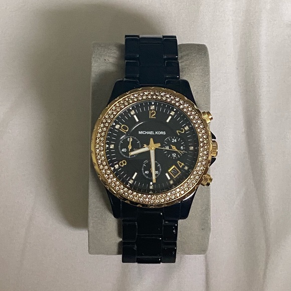 Michael Kors Accessories - Michael Kors black and gold watch